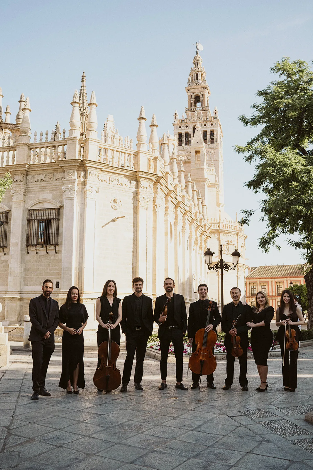 The Música Para Boda team in front of Seville Cathedral and the Giralda